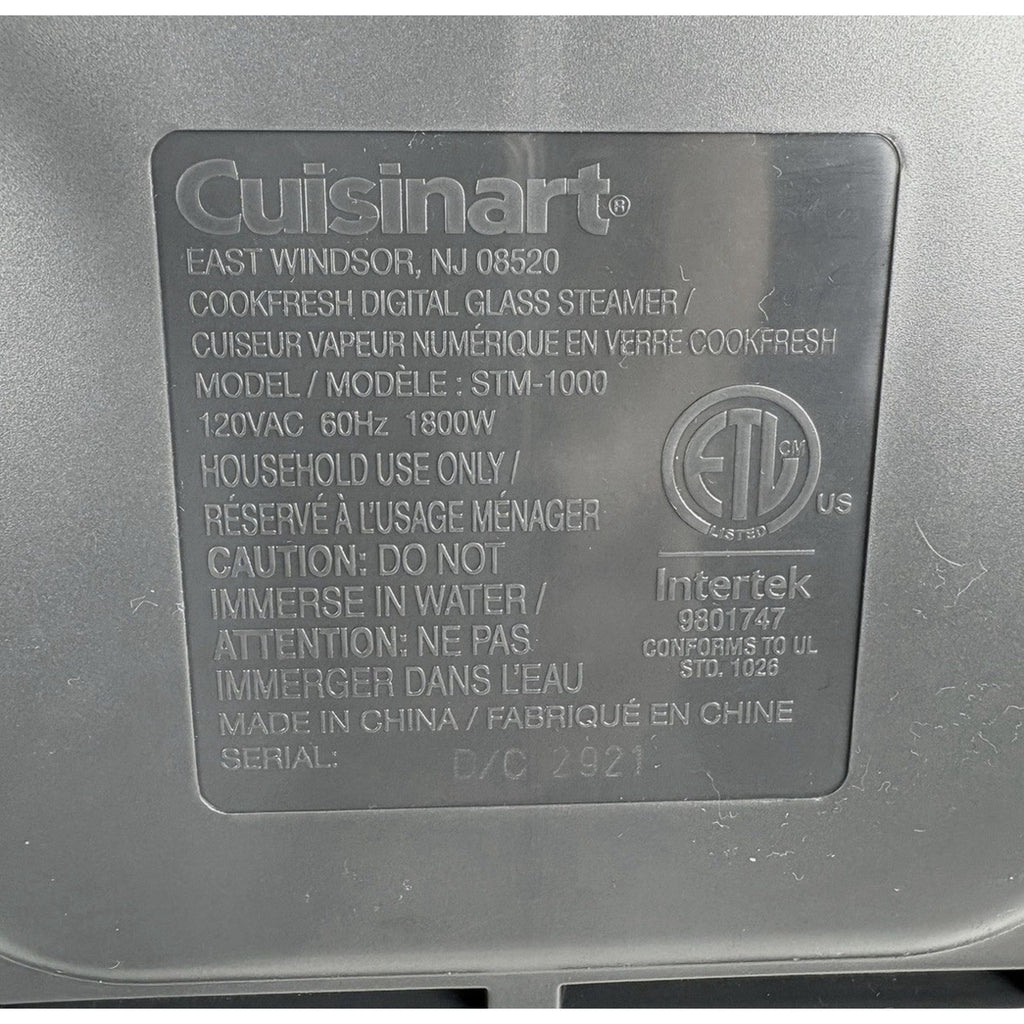 Cuisinart CookFresh steamer underside label showing model STM-1000, 120 VAC, 60 Hz, 1800 W and Made in China.