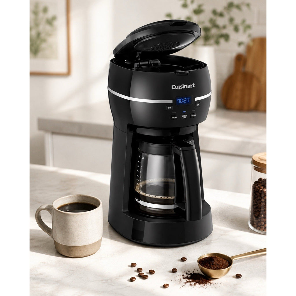 Catalog view of black Cuisinart DCC-1500FR coffee maker brewing into glass carafe with top lid open, cup, beans, and coffee scoop.