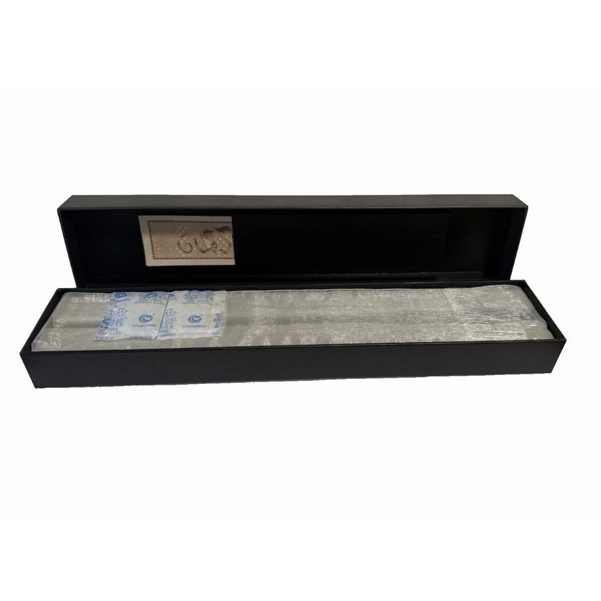 Open Redwood wand presentation box with protective covering and two desiccant packets.