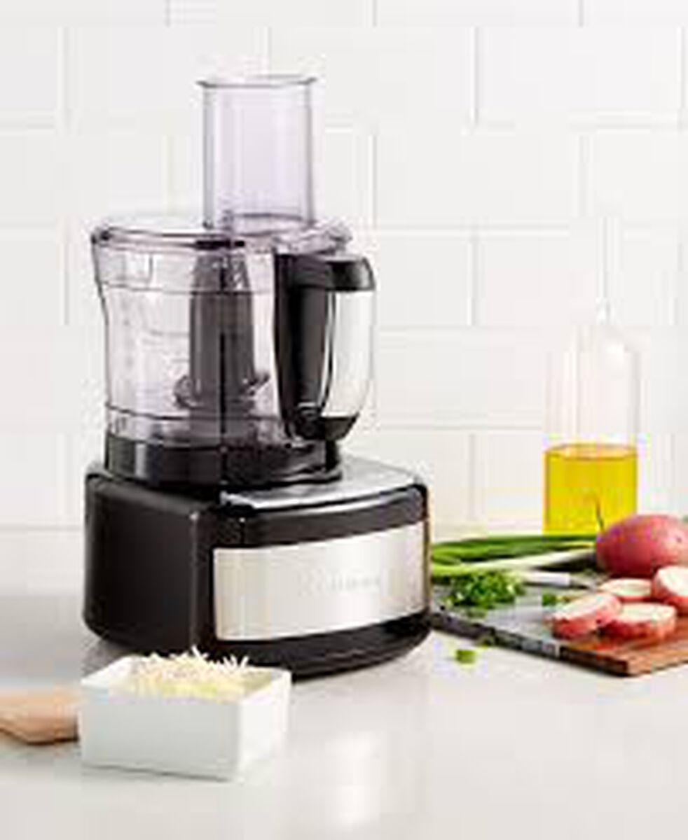 Manufacturer catalog image of the Cuisinart CFP-8BK food processor on a kitchen counter.