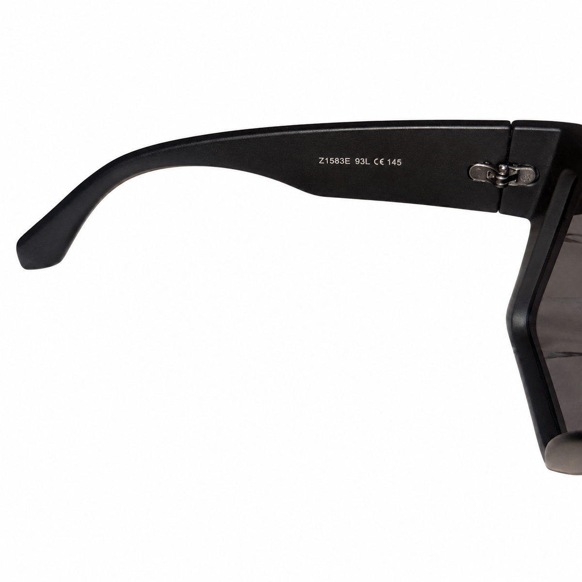 Louis Vuitton Waimea sunglasses, interior temple marking Z1583E 93L CE 145 and hinge detail on white.