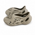 Adidas Yeezy Foam Runner Ochre GW3354 pair on white background